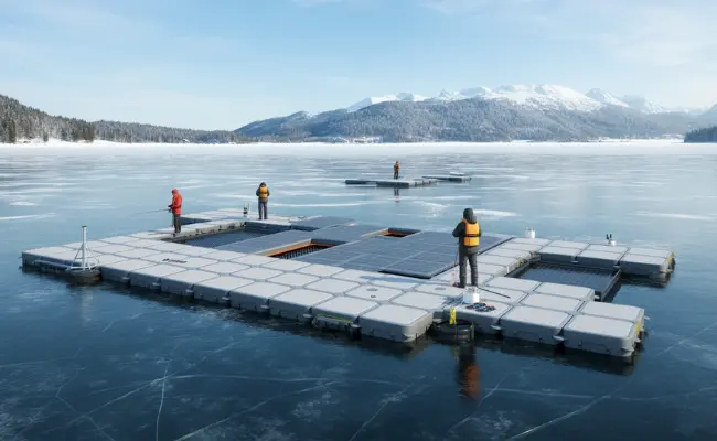 people fishing on a floating platform in the water